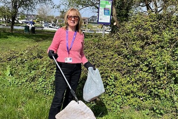 Bernadette collecting litter